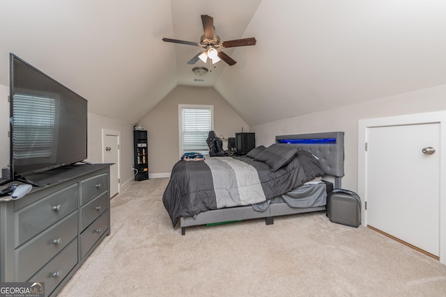 924 Abingdon Cv, Bonaire, GA 31005 - bedroom with vaulted ceiling, light carpet, baseboards, and ceiling fan
