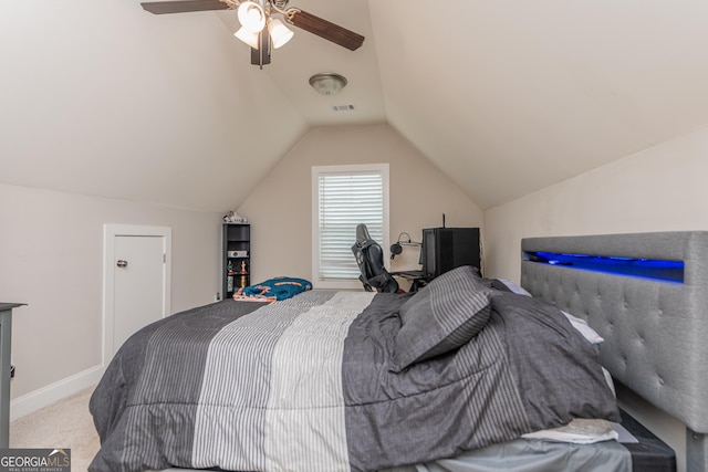 924 Abingdon Cv, Bonaire, GA 31005 - bedroom with vaulted ceiling, carpet floors, a ceiling fan, and baseboards