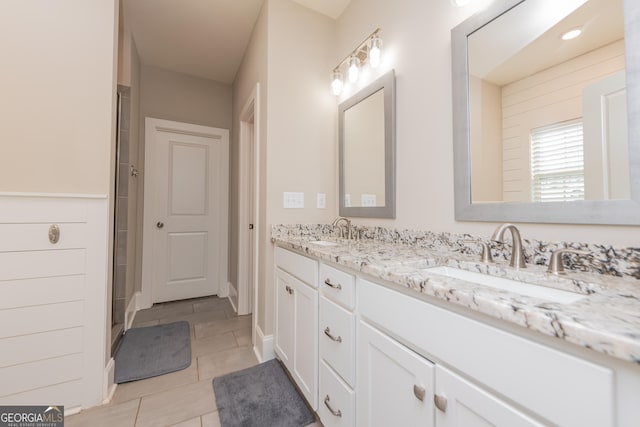 924 Abingdon Cv, Bonaire, GA 31005 - full bath featuring double vanity, a shower, tile patterned flooring, and baseboards