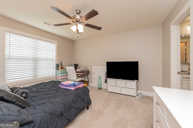 924 Abingdon Cv, Bonaire, GA 31005 - bedroom featuring light carpet, baseboards, and ceiling fan