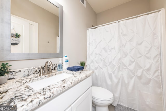 924 Abingdon Cv, Bonaire, GA 31005 - full bath featuring vanity, toilet, and a shower with curtain