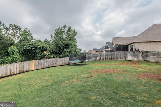 924 Abingdon Cv, Bonaire, GA 31005 - view of yard with a trampoline