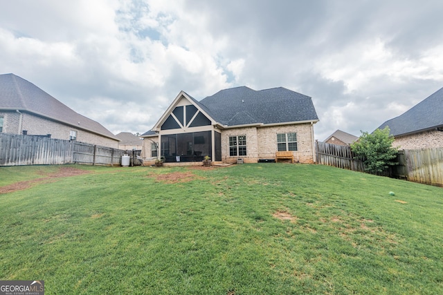 924 Abingdon Cv, Bonaire, GA 31005 - rear view of property featuring a sunroom, brick siding, and a shingled roof