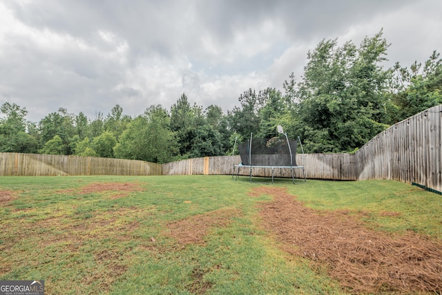 924 Abingdon Cv, Bonaire, GA 31005 - view of yard featuring a trampoline