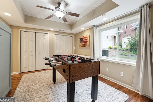 151 Overhill Pt, Alpharetta, GA 30005 - recreation room featuring crown molding, ceiling fan, wood finished floors, recessed lighting, and a tray ceiling