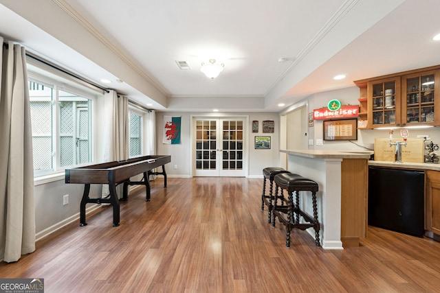 151 Overhill Pt, Alpharetta, GA 30005 - indoor wet bar with light wood-type flooring, dishwasher, a raised ceiling, recessed lighting, and baseboards