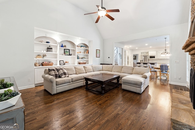 151 Overhill Pt, Alpharetta, GA 30005 - living room featuring high vaulted ceiling, dark wood-style flooring, a ceiling fan, a fireplace, and baseboards