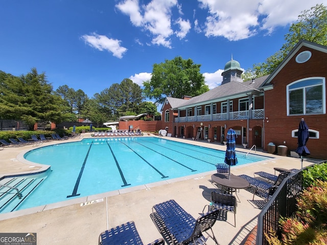151 Overhill Pt, Alpharetta, GA 30005 - community pool featuring a patio area