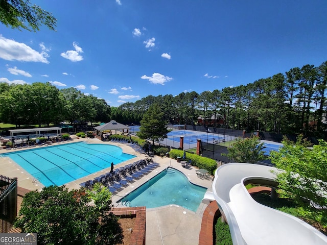 151 Overhill Pt, Alpharetta, GA 30005 - community pool with a water slide and view of scattered trees