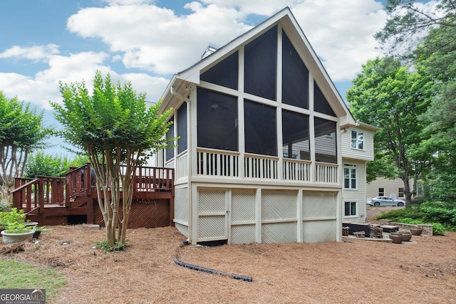 151 Overhill Pt, Alpharetta, GA 30005 - back of property featuring a deck and a sunroom