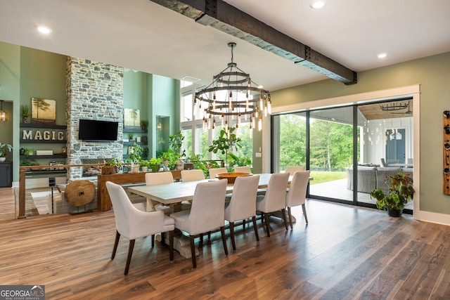 209 Voyles Way, Dawsonville, GA 30534 - dining area with wood finished floors, beamed ceiling, a chandelier, a fireplace, and recessed lighting
