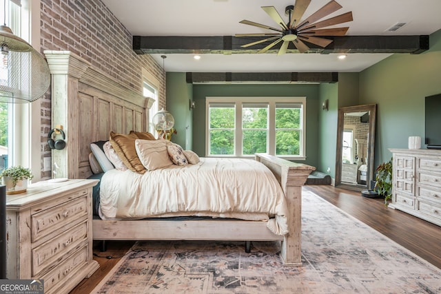 209 Voyles Way, Dawsonville, GA 30534 - bedroom with dark wood-type flooring, multiple windows, and brick wall