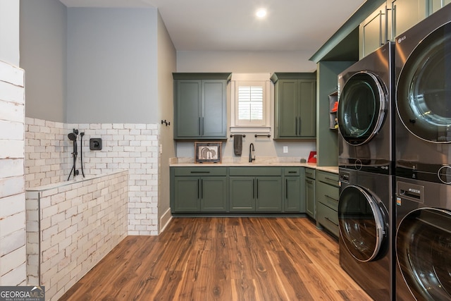 209 Voyles Way, Dawsonville, GA 30534 - laundry area with stacked washer / dryer and dark wood-style flooring