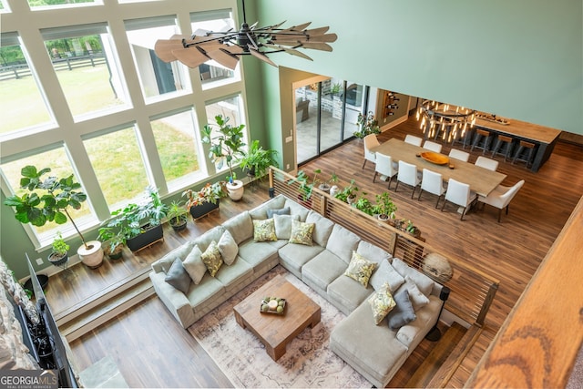 209 Voyles Way, Dawsonville, GA 30534 - living room with a towering ceiling and wood finished floors