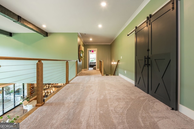 209 Voyles Way, Dawsonville, GA 30534 - hall featuring a barn door, ornamental molding, an upstairs landing, recessed lighting, and baseboards