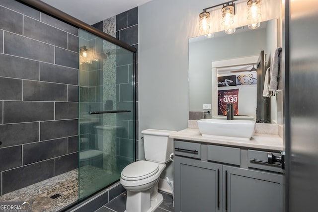 209 Voyles Way, Dawsonville, GA 30534 - bathroom with vanity, toilet, and a tile shower