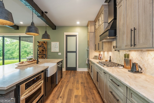 209 Voyles Way, Dawsonville, GA 30534 - kitchen featuring wall chimney exhaust hood, stainless steel appliances, baseboards, backsplash, and a sink