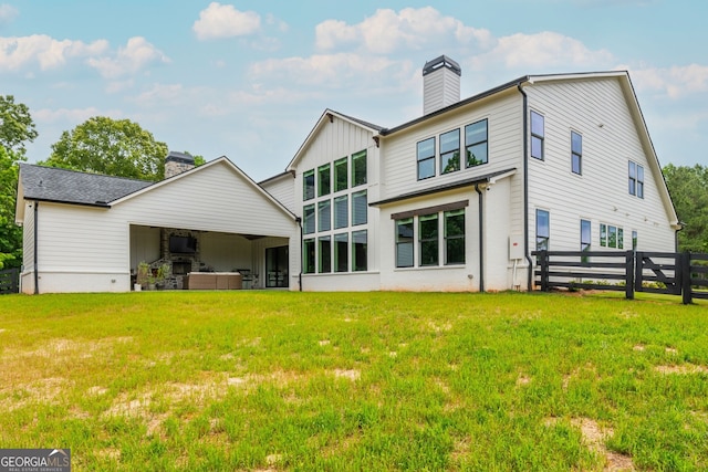 209 Voyles Way, Dawsonville, GA 30534 - back of property with a chimney