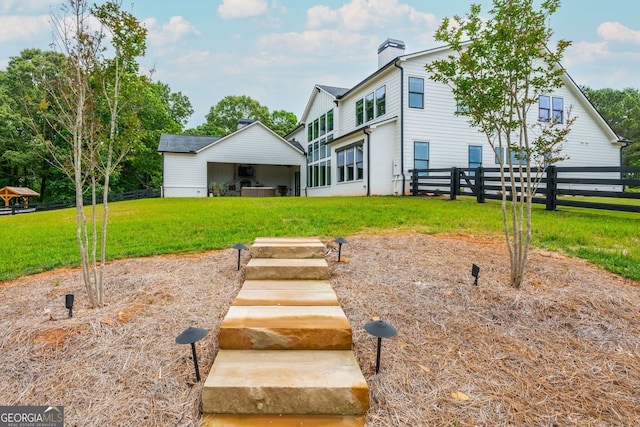 209 Voyles Way, Dawsonville, GA 30534 - back of house with a chimney