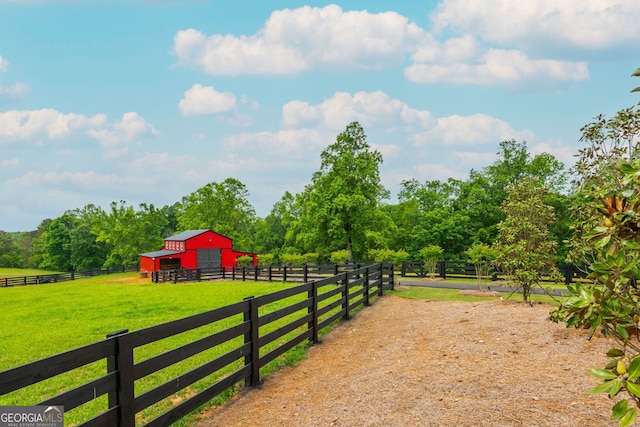 209 Voyles Way, Dawsonville, GA 30534 - view of yard with an outdoor structure, a pole building, and an exterior structure