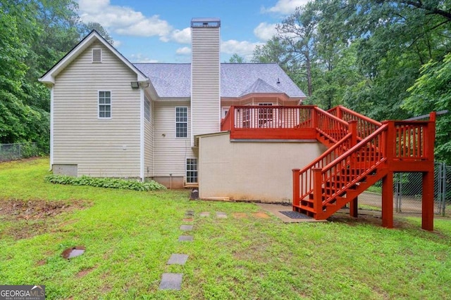 4544 Dorsett Shoals Run, Douglasville, GA 30135 - back of house with stairway, a deck, and a chimney