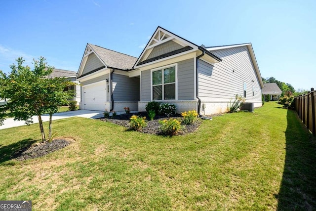 2856 Knob Creek Dr, Snellville, GA 30078 - view of front facade featuring an attached garage, brick siding, driveway, and central AC unit
