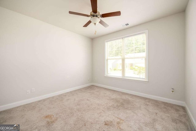 2856 Knob Creek Dr, Snellville, GA 30078 - carpeted spare room with baseboards and ceiling fan