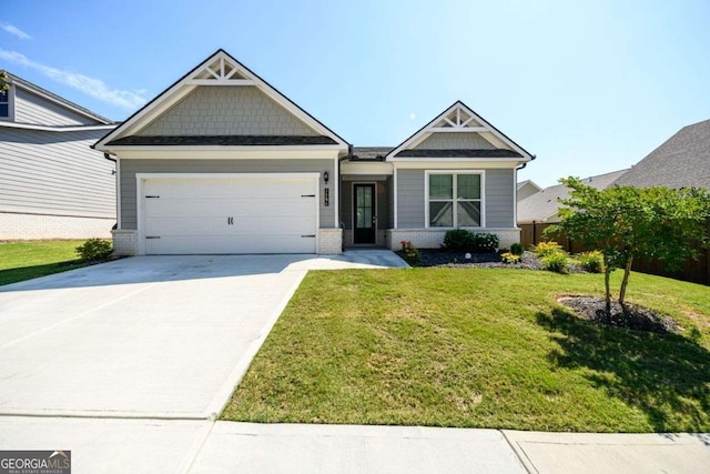 2856 Knob Creek Dr, Snellville, GA 30078 - craftsman house featuring a garage, concrete driveway, and brick siding