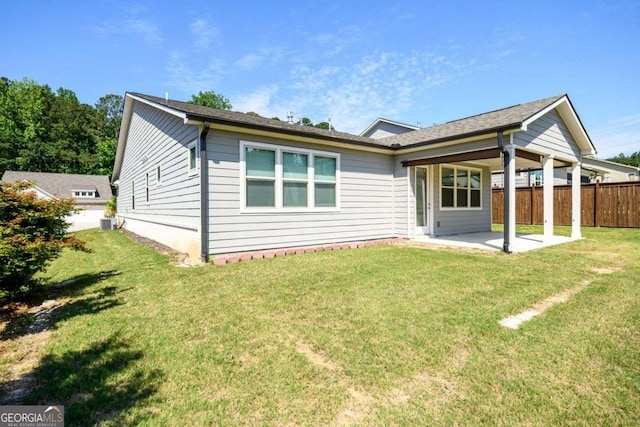 2856 Knob Creek Dr, Snellville, GA 30078 - back of property with a patio area and central air condition unit
