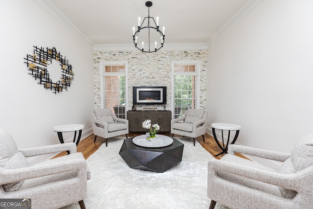 720 Latrobe Way, Macon, GA 31220 - living room featuring ornamental molding, wood finished floors, a chandelier, and baseboards
