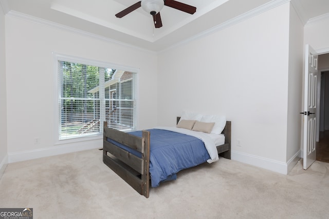 720 Latrobe Way, Macon, GA 31220 - carpeted bedroom featuring a tray ceiling, ornamental molding, baseboards, and a ceiling fan
