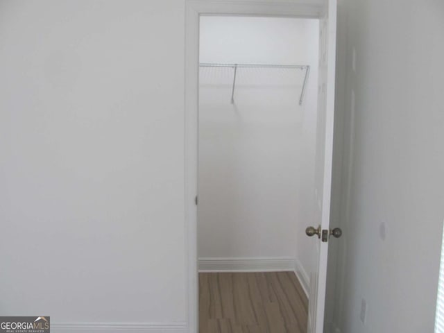 115 Red Hawk Ct, Waynesville, GA 31566 - spacious closet featuring wood finished floors