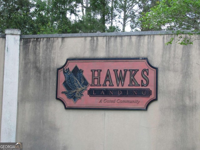115 Red Hawk Ct, Waynesville, GA 31566 - exterior view of stucco siding