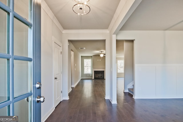 4063 Links Blvd, Jefferson, GA 30549 - foyer entrance with a fireplace, dark wood-style flooring, a chandelier, a ceiling fan, and stairway