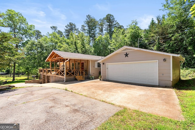 104 Overlook Dr, Martin, GA 30557 - view of front of property featuring covered porch, an outbuilding, and a garage
