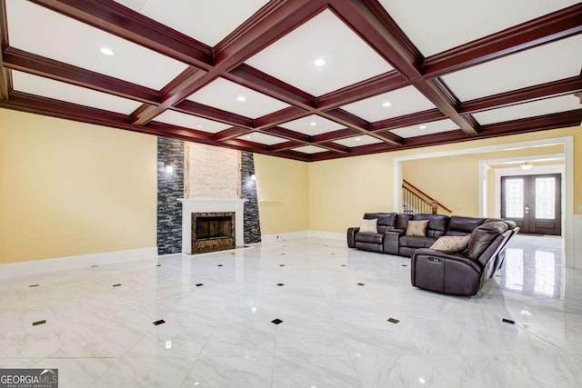 332 Warwick Pl, Mcdonough, GA 30253 - living area with stairs, beam ceiling, coffered ceiling, a stone fireplace, and french doors