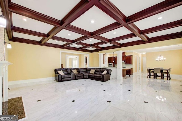 332 Warwick Pl, Mcdonough, GA 30253 - living room featuring ornate columns, coffered ceiling, beam ceiling, a chandelier, and light marble finish floors