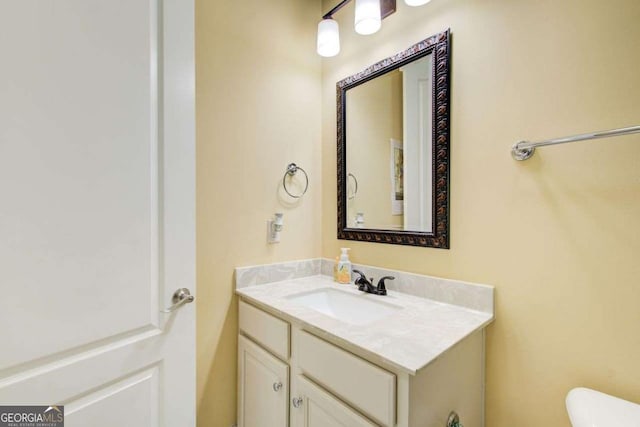 332 Warwick Pl, Mcdonough, GA 30253 - half bathroom featuring vanity and toilet