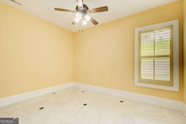 332 Warwick Pl, Mcdonough, GA 30253 - spare room with ceiling fan and baseboards