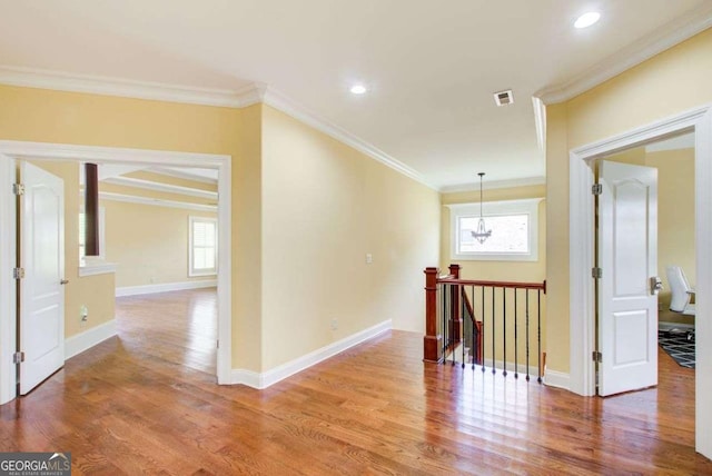 332 Warwick Pl, Mcdonough, GA 30253 - corridor featuring an upstairs landing, healthy amount of natural light, wood finished floors, ornamental molding, and recessed lighting