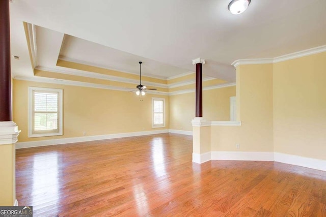 332 Warwick Pl, Mcdonough, GA 30253 - unfurnished living room featuring plenty of natural light, light wood-type flooring, and crown molding