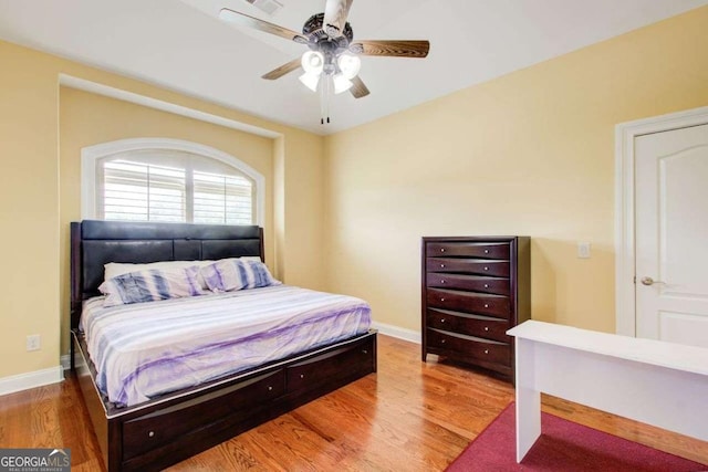 332 Warwick Pl, Mcdonough, GA 30253 - bedroom with wood finished floors, baseboards, and ceiling fan