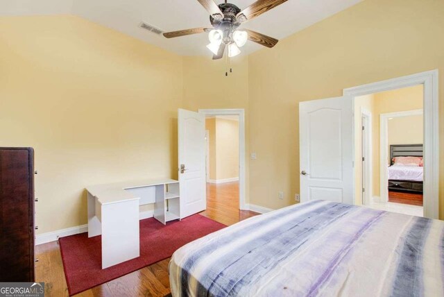 332 Warwick Pl, Mcdonough, GA 30253 - bedroom featuring wood finished floors, baseboards, high vaulted ceiling, and a ceiling fan