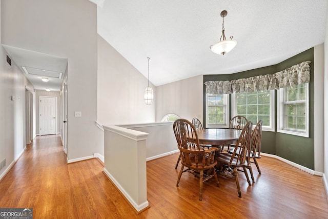 2623 Lone Oak Trl NW, Kennesaw, GA 30144 - dining room with light wood finished floors, baseboards, and high vaulted ceiling