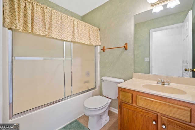 2623 Lone Oak Trl NW, Kennesaw, GA 30144 - bathroom with vanity, toilet, tile patterned floors, and combined bath / shower with glass door