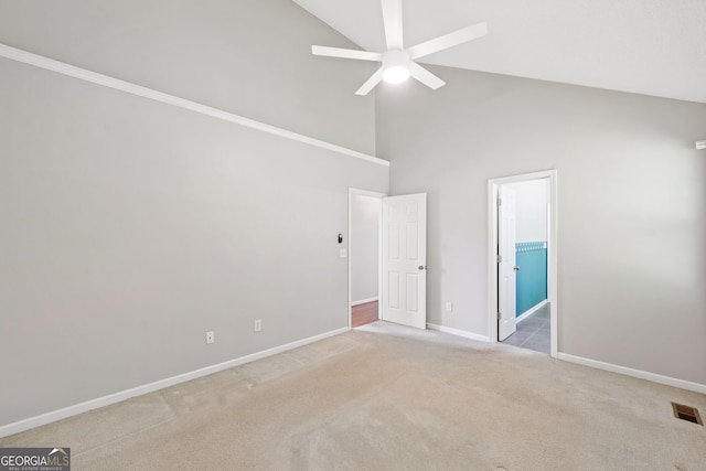 2623 Lone Oak Trl NW, Kennesaw, GA 30144 - unfurnished bedroom featuring high vaulted ceiling, carpet, baseboards, ceiling fan, and connected bathroom