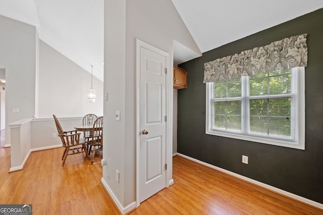 2623 Lone Oak Trl NW, Kennesaw, GA 30144 - dining room with vaulted ceiling, light wood-type flooring, and baseboards