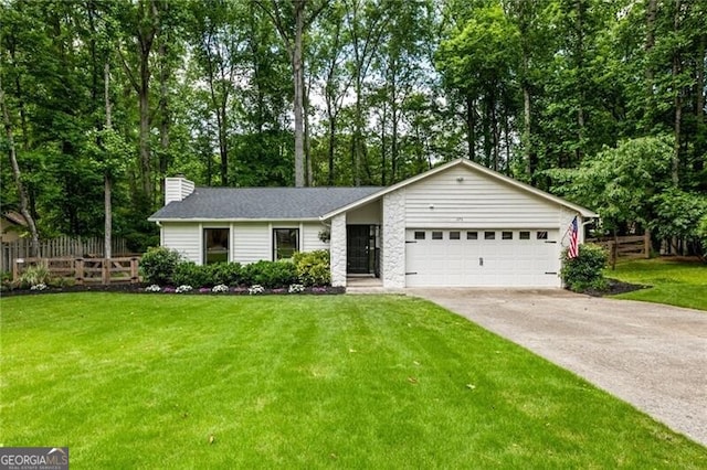 171 N Trce, Alpharetta, GA 30009 - view of front facade featuring an attached garage, a chimney, driveway, and view of scattered trees