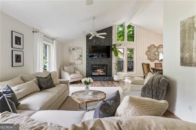 171 N Trce, Alpharetta, GA 30009 - living area with wood finished floors, ceiling fan, a stone fireplace, and baseboards