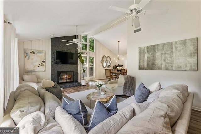 171 N Trce, Alpharetta, GA 30009 - living area with ceiling fan, wood finished floors, lofted ceiling, and a fireplace